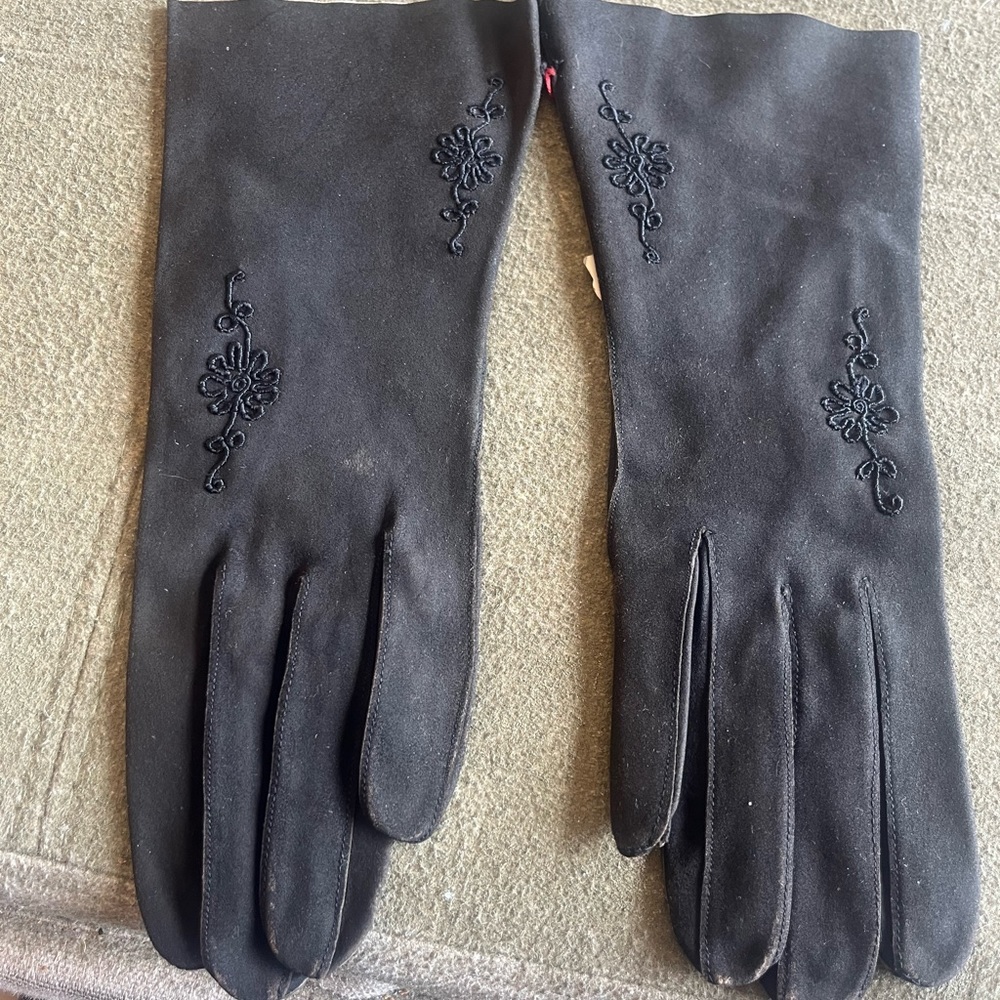 These are vintage black white women’s gloves made in France